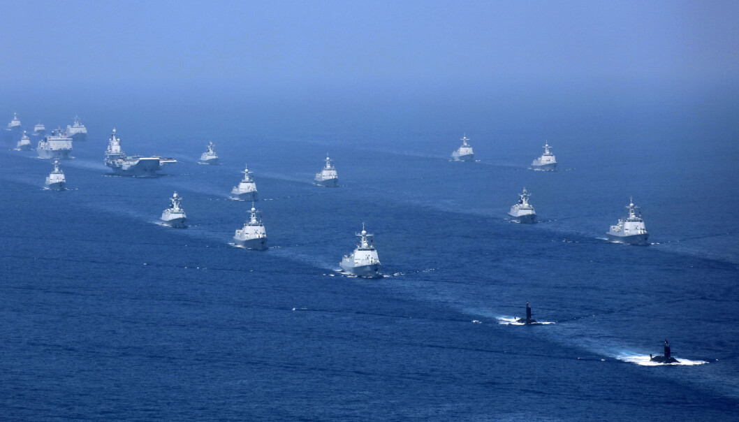 OMSTRIDT: Bildet fra 12. april 2018 er gitt ut av det statlige, kinesiske nyhetsbyrået Xinhua, og viser kinesiske marinefartøy i forbindelse med en øvelse i Sørkinahavet. OMSTRIDT: Bildet fra 12. april 2018 er gitt ut av det statlige, kinesiske nyhetsbyrået Xinhua, og viser kinesiske marinefartøy i forbindelse med en øvelse i Sørkinahavet.