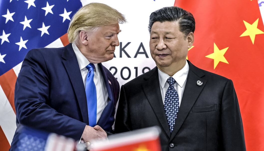 Donald Trump hilser på Kinas president Xi Jinping under G-20 møtet i Japan i 2019. Donald Trump hilser på Kinas president Xi Jinping under G-20 møtet i Japan i 2019.