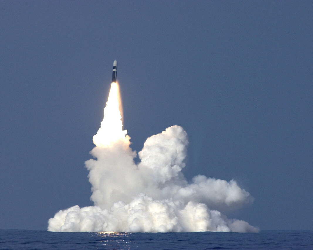 MISSILE: A Trident II D5 Missile breaking the surface, having been fired from HMS Vanguard a Strategic Missile Submarine. MISSILE: A Trident II D5 Missile breaking the surface, having been fired from HMS Vanguard a Strategic Missile Submarine.