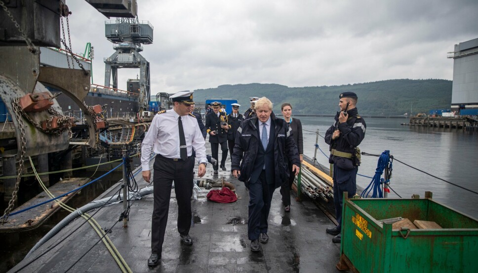 SUBMARINE VISIT: UK Prime Minister Boris Johnson visits the HMNB Clyde in 2019, where he was given a tour of one of the country's four nuclear-powered submarines of the Vanguard class, which is based there and equipped with Trident D5 nuclear missiles.