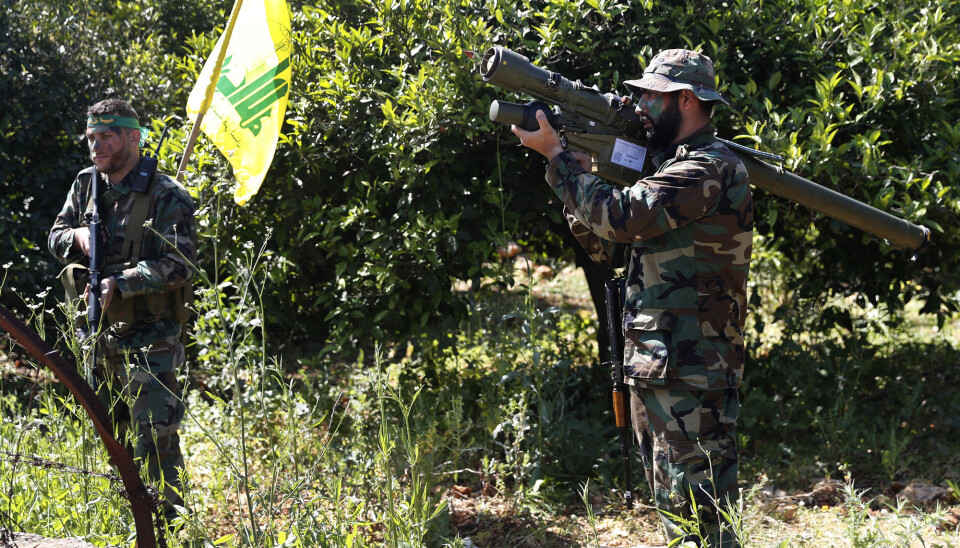 En amerikansk tolk er dømt til 23 år i fengsel for å ha forrådt kilder i Irak til en person tilknyttet Hizbollah. Her ser vi krigere fra Hizbollah i Libanon.