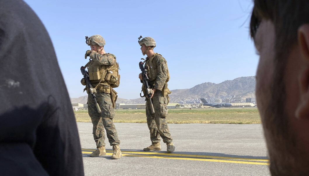 SOLDATER: Amerikanske soldater holder vakt på flyplassen i Kabul. Så langt har USA evakuert 3.200 mennesker fra landet. SOLDATER: Amerikanske soldater holder vakt på flyplassen i Kabul. Så langt har USA evakuert 3.200 mennesker fra landet.