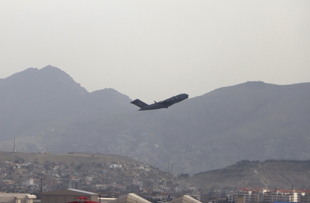 AFGHANISTAN-EXIT: Et amerikansk militærfly tar av fra Hamid Karzai International Airport i Kabul mandag 30. august 2021. AFGHANISTAN-EXIT: Et amerikansk militærfly tar av fra Hamid Karzai International Airport i Kabul mandag 30. august 2021.