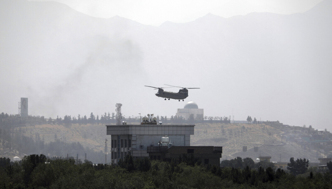 FRYKTER KOLLAPS: Et amerikansk Chinook-helikopter flyr over Afghanistans hovedstad Kabul 15. august. FNs generalsekretær António Guterres frykter konsekvensene hvis økonomien kollapser. FRYKTER KOLLAPS: Et amerikansk Chinook-helikopter flyr over Afghanistans hovedstad Kabul 15. august. FNs generalsekretær António Guterres frykter konsekvensene hvis økonomien kollapser.