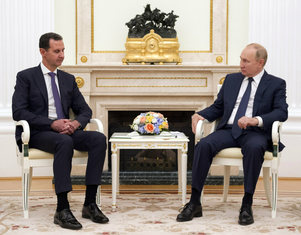 HAT-ELSK: Russlands president Vladimir Putin, til høyre, lytter til Syrias president Bashar Assad under deres møte i Kreml i Moskva, Russland, 13. september 2021.