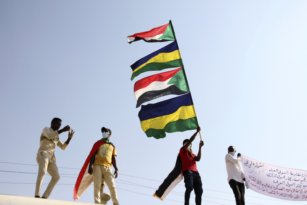 Demonstranter i Sudans hovedstad Khartoum torsdag. Demonstranter i Sudans hovedstad Khartoum torsdag.