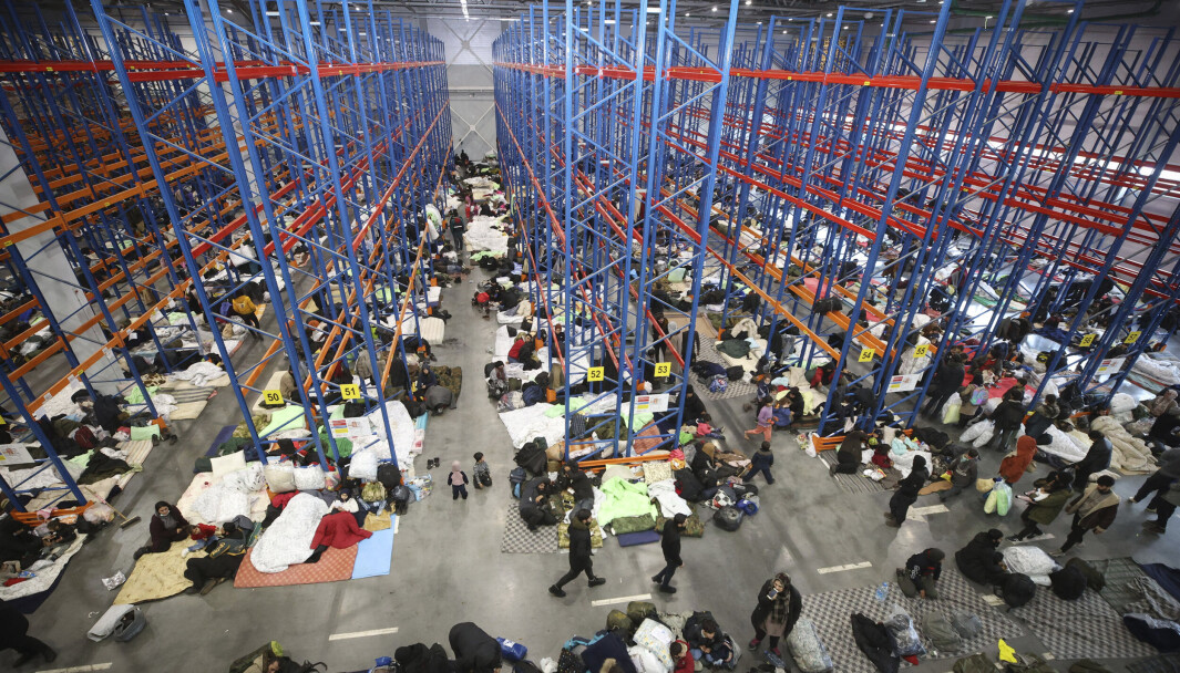 MOTTAKSSENTER: Hviterussland flyttet onsdag og torsdag rundt 2000 migranter til dette mottakssenteret nær grensen til Polen. MOTTAKSSENTER: Hviterussland flyttet onsdag og torsdag rundt 2000 migranter til dette mottakssenteret nær grensen til Polen.