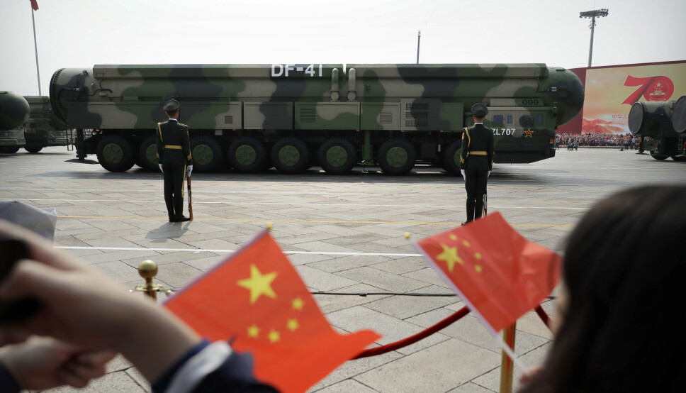 KINA: Kjøretøy med ballistiske missiler vises fram under en parade i Beijing. Når Nato utarbeider sitt nye strategiske konsept blir Kina trolig ikke definert som en motstander, til tross for bekymring knyttet til landets økende militærmakt.