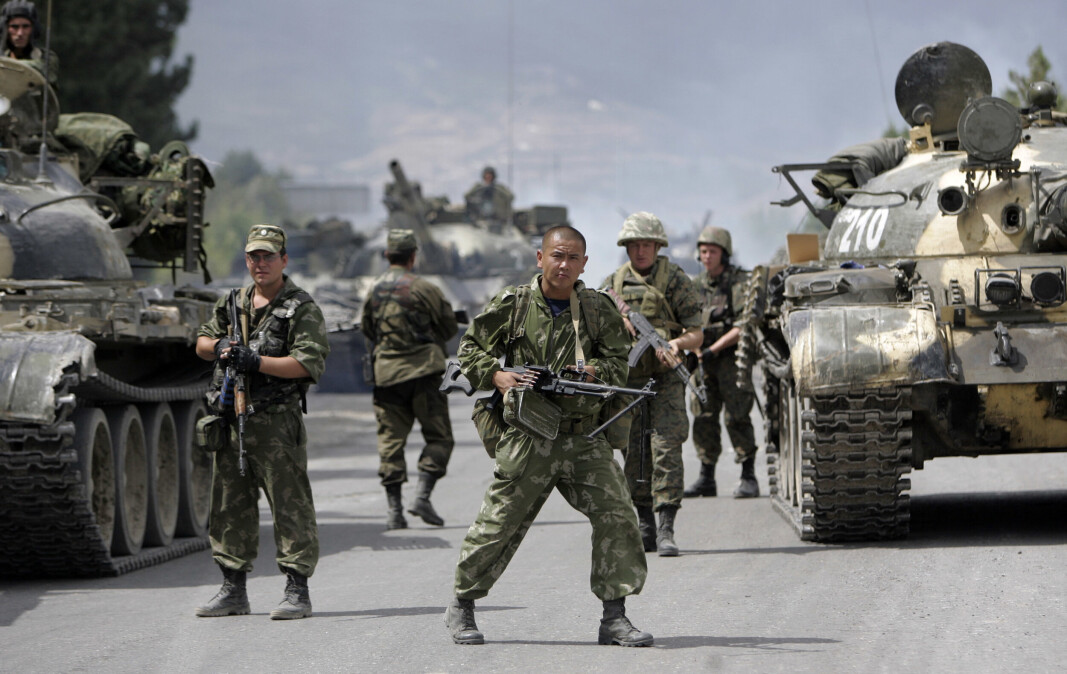 GEORGIA: Russiske soldater utenfor den georgiske byen Gori i august 2014. GEORGIA: Russiske soldater utenfor den georgiske byen Gori i august 2014.