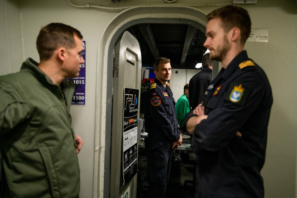 PILOT: Liaison-offiser Frode Nakken (midten) og Jørgen Sørli (t.h.) sammen med en amerikansk pilot.