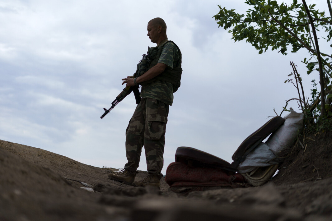 SOLDAT: En ukrainsk soldat i utkanten av Slavjansk 5. august. SOLDAT: En ukrainsk soldat i utkanten av Slavjansk 5. august.