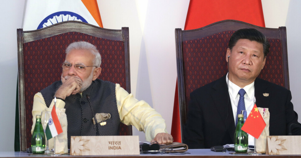 SAMMENSTØT: Indias statsminister Narendra Modi, til venstre, og Kinas president Xi Jinping deltok på et felles møte i India i oktober 2016. Siden det blodige grensesammenstøtet mellom indiske og kinesiske soldater i Ladakh-regionen sommeren 2020, har Indias regjering i økende grad rettet oppmerksomheten mot Beijing. Det representere et skifte i Indias utenrikspolitikk.