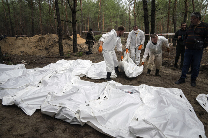 DRAP: Eksperter jobber med massegravene funnet i byen Izium i Ukraina 16. september 2022. DRAP: Eksperter jobber med massegravene funnet i byen Izium i Ukraina 16. september 2022.