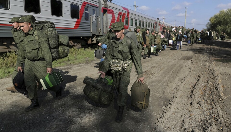 REKRUTTER: Russiske rekrutter i ferd med å gå om bord på et tog ved Prudboi i regionen Volgograd. Bildet er fra september 2020.