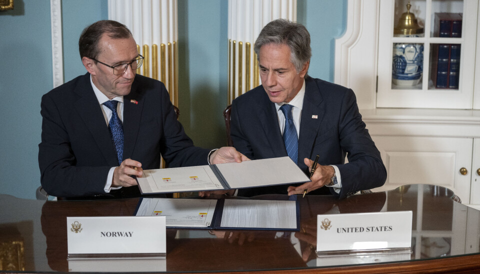 Secretary of State Antony Blinken, right, and Norway's Foreign Minister Espen Barth Eide exchange documents during a memorandum of cooperation signing ceremony at the State Department on Monday, Sept. 30, 2024, in Washington. (AP Photo/Kevin Wolf)