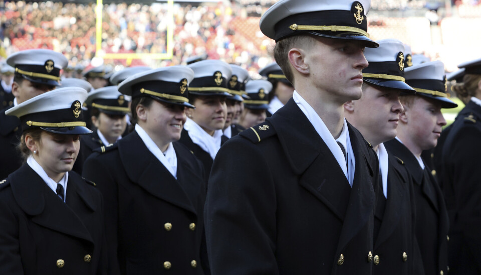 Midshipmen march before an NCAA college football game between Army and Navy, Saturday, Dec. 14, 2024, in Landover, Md. (AP Photo/Daniel Kucin Jr.)